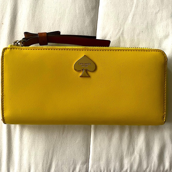 kate spade Handbags - Kate Spade New York Yellow Zippy Wallet
